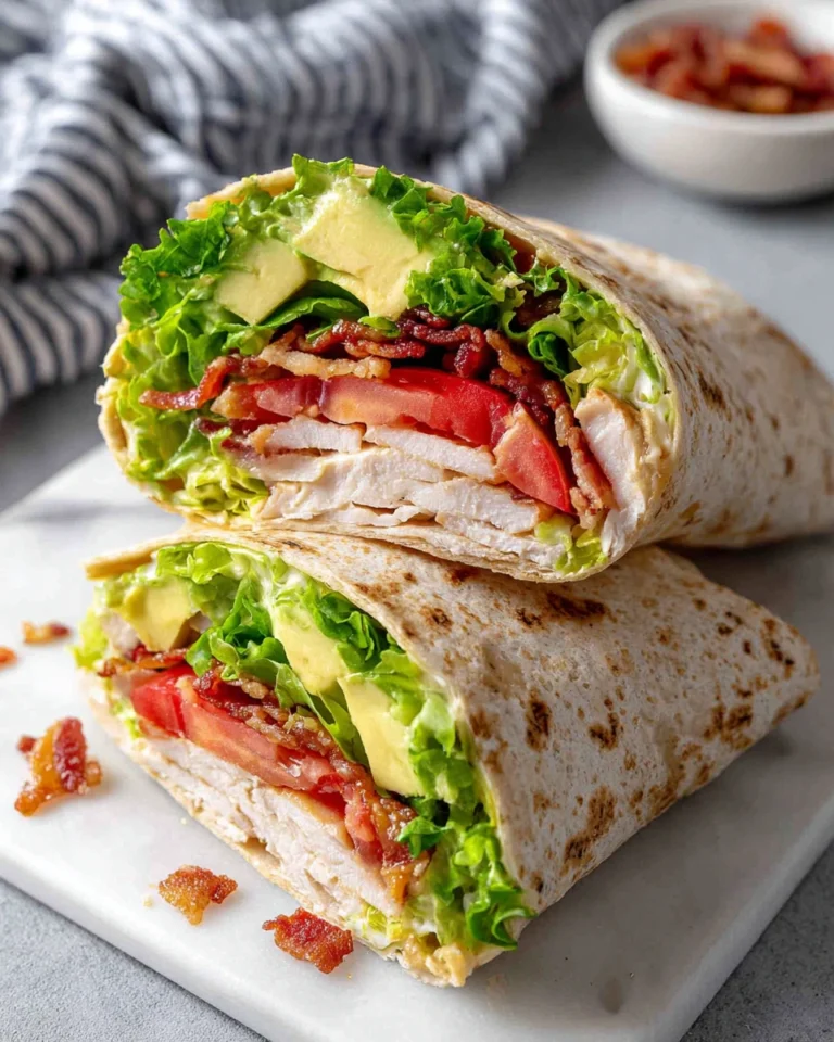 Discover the best California Turkey Club Wraps recipe made with juicy turkey, crispy bacon, creamy avocado, fresh lettuce, and tomatoes wrapped in a soft tortilla. This easy 20-minute lunch is perfect for busy weekdays, meal prep, picnics, or a light family dinner.