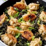 One Pan Greens and Dumplings makes a quick, comforting dinner with golden dumplings, tender greens, ginger, and chili crisp